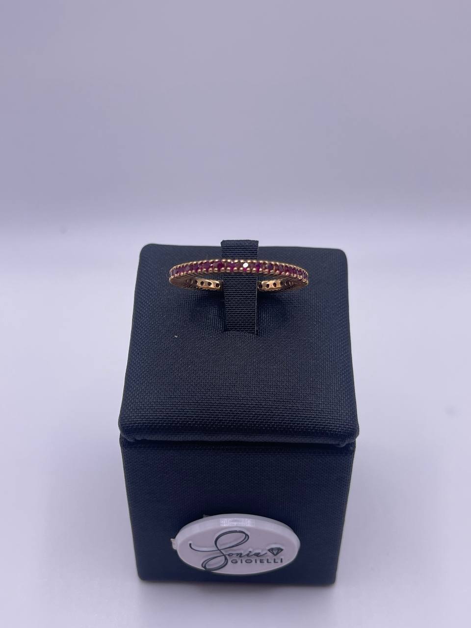 ANELLO VERETTA IN ORO ROSA E RUBINI